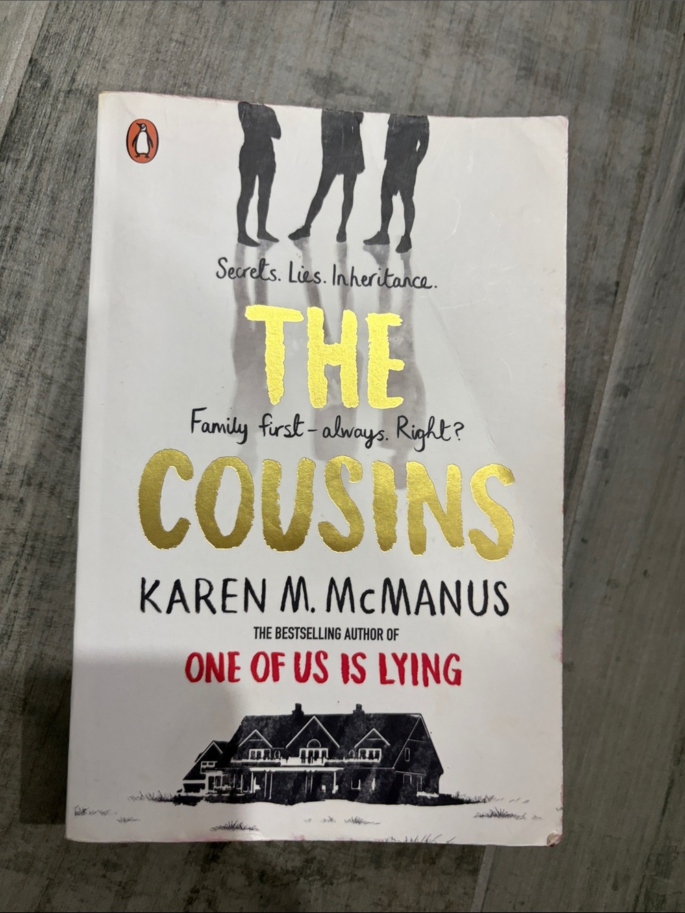 Original Penguin white book cover with gold and black text